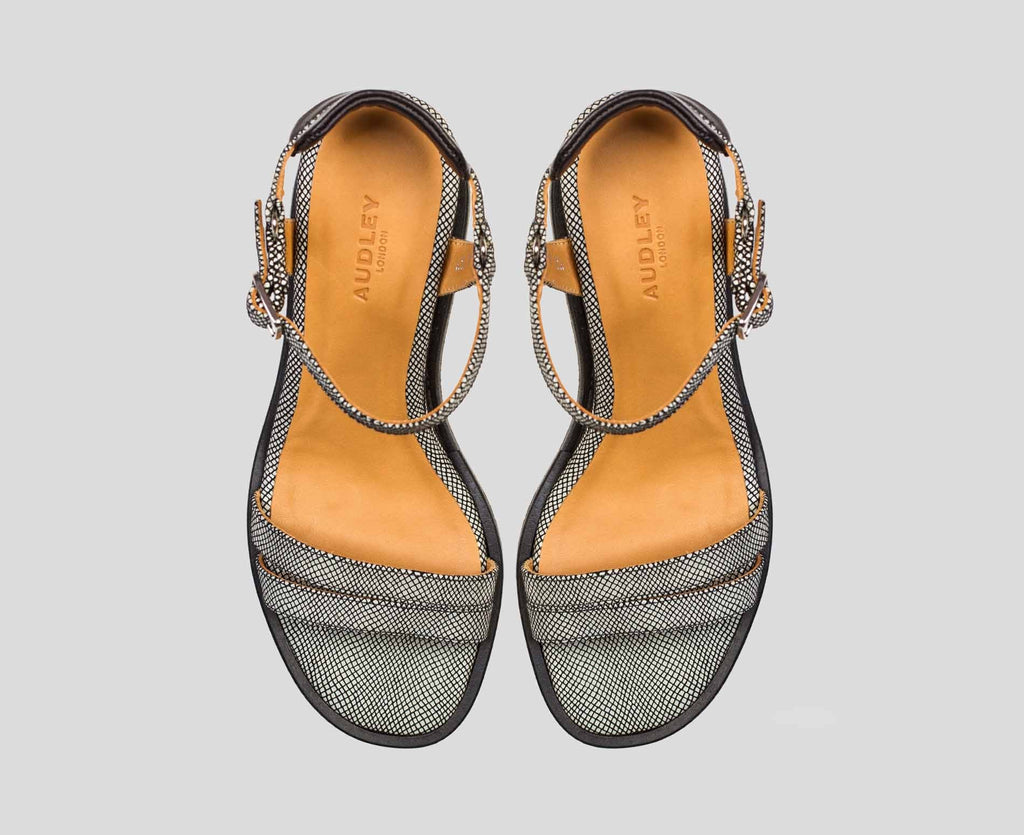 Sandalia de mujer en piel con cuña. Bionda