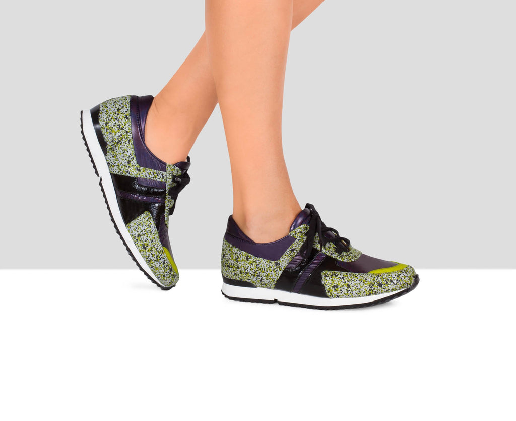 Women's leather sneaker with a low heel. Easter