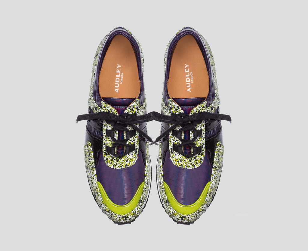 Women's leather sneaker with a low heel. Easter