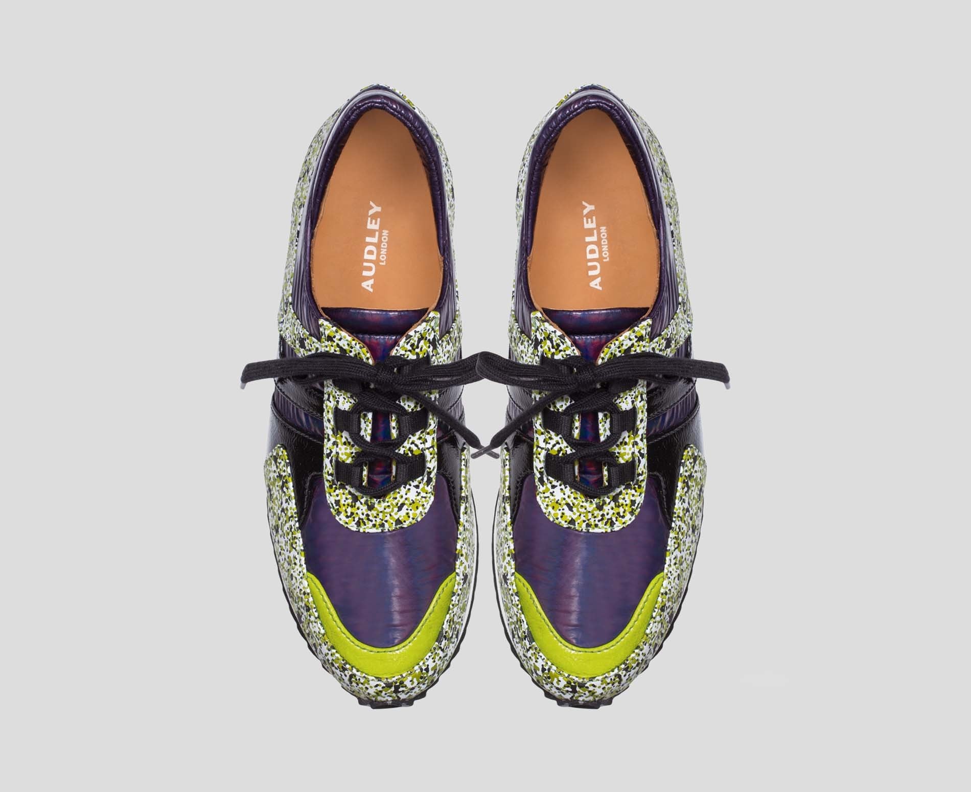 Women's leather sneaker with a low heel. Easter