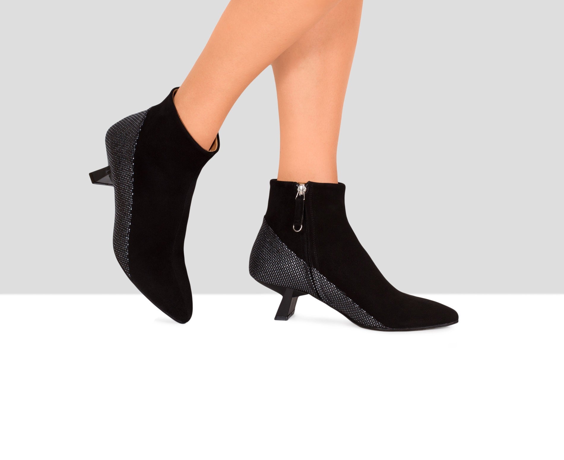 Stivaletti da donna in pelle con tacco medio. Evani