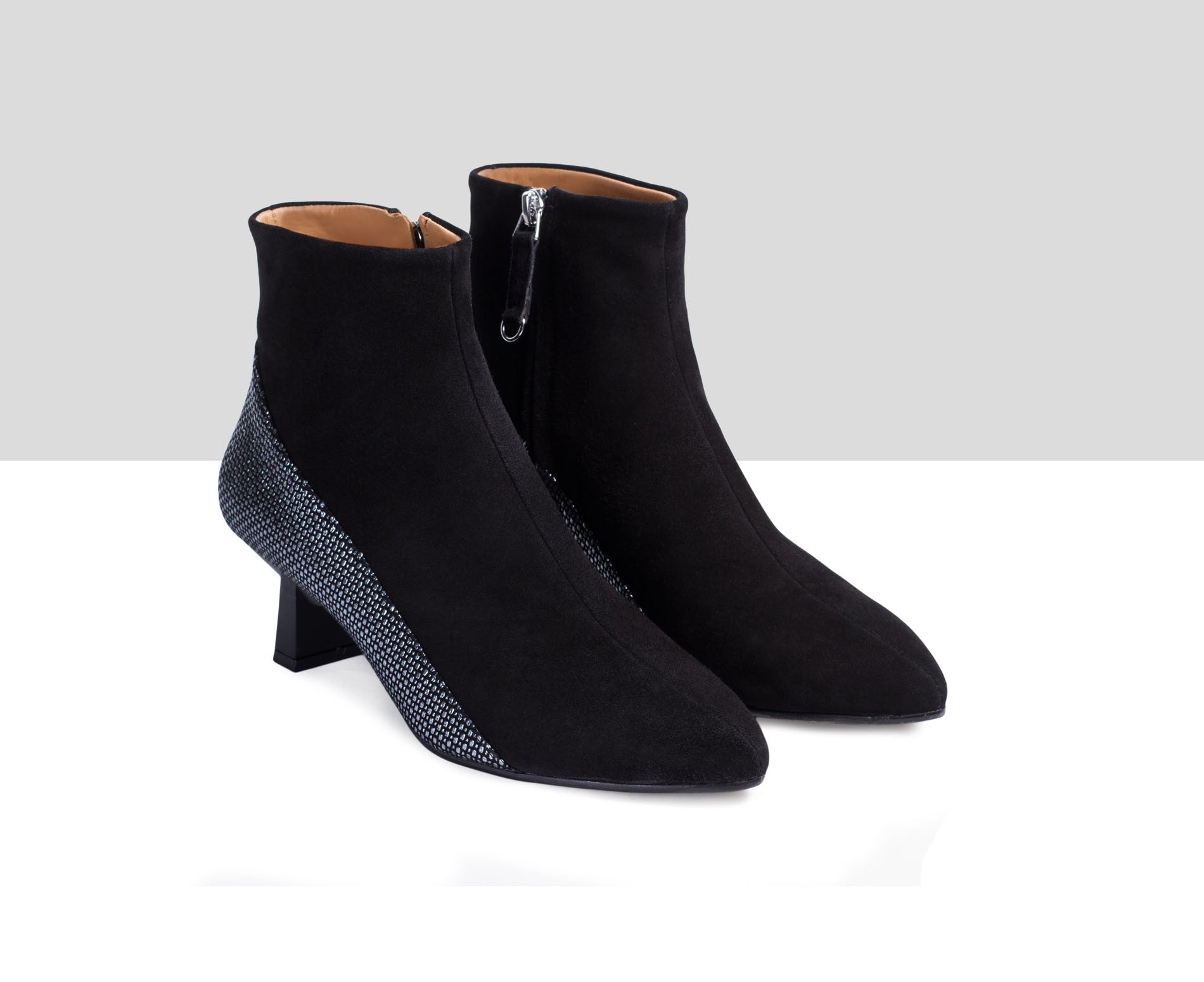 Stivaletti da donna in pelle con tacco medio. Evani