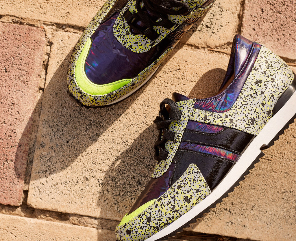 Women's leather sneaker with a low heel. Easter