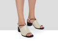 Women's leather sandal with a medium heel. Flavina