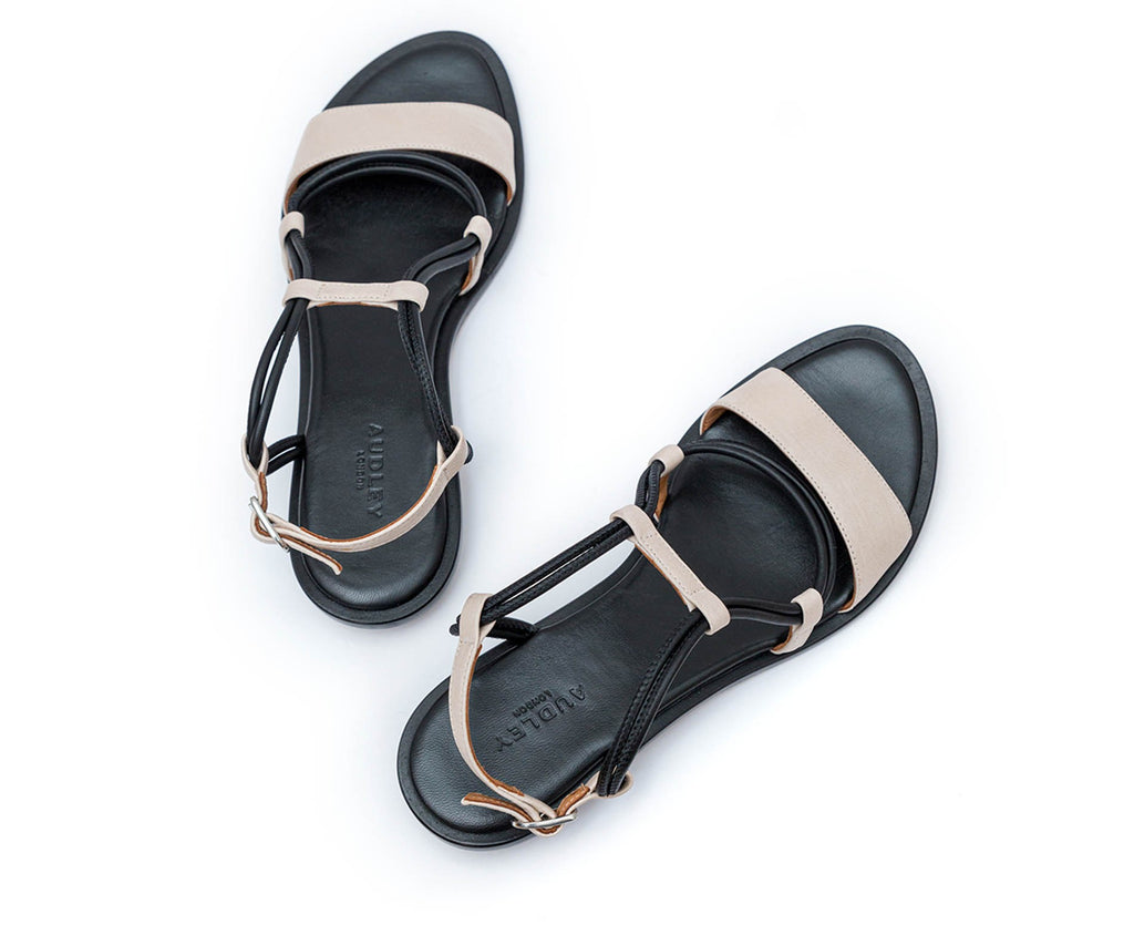 Women's flat leather sandal. Filotea