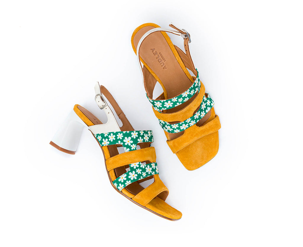 Women's leather sandal with a medium heel. Flora
