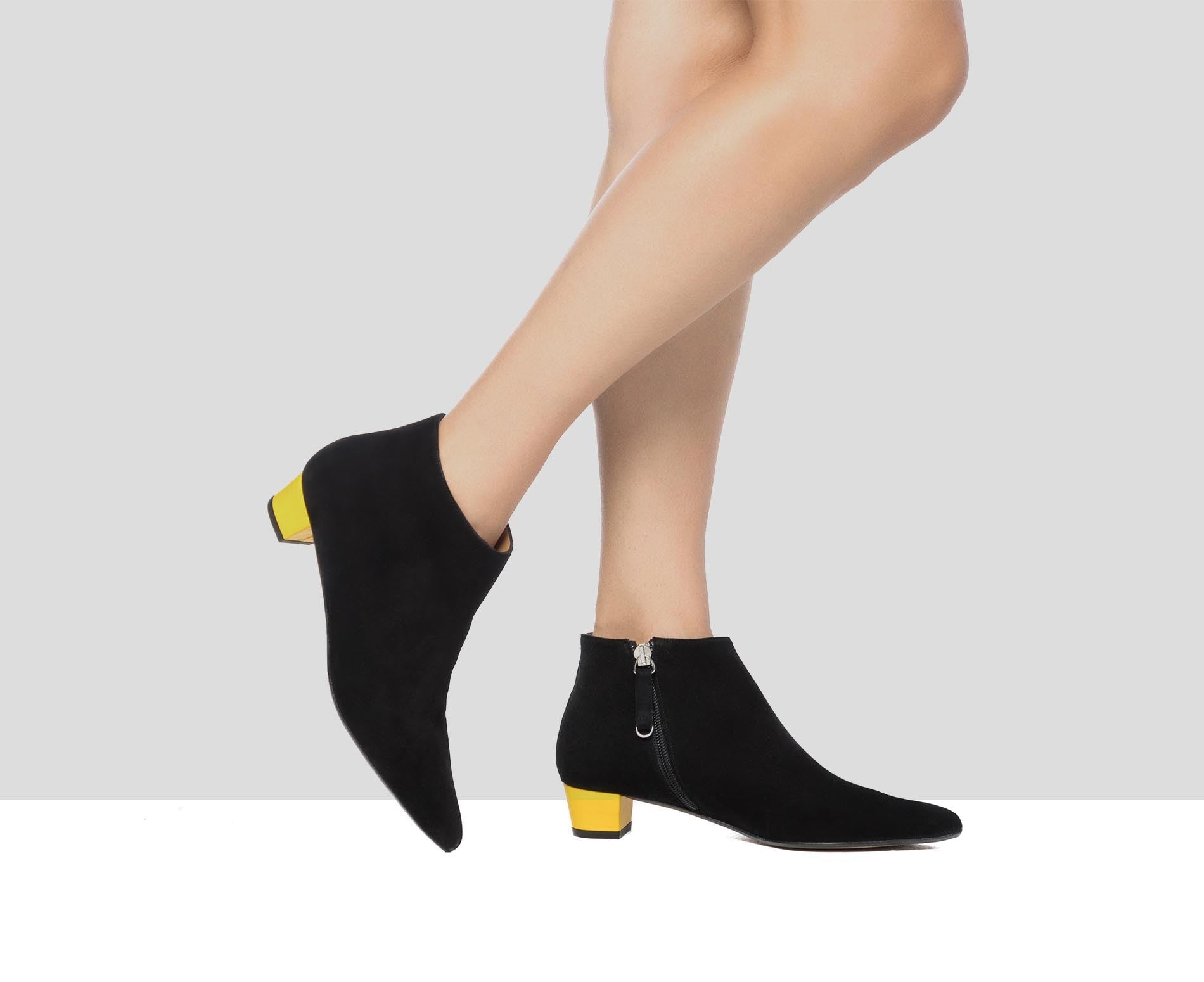 Botín de mujer en piel con tacón bajo. Gioia