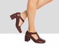 Women's leather shoe with a medium heel. Imelda