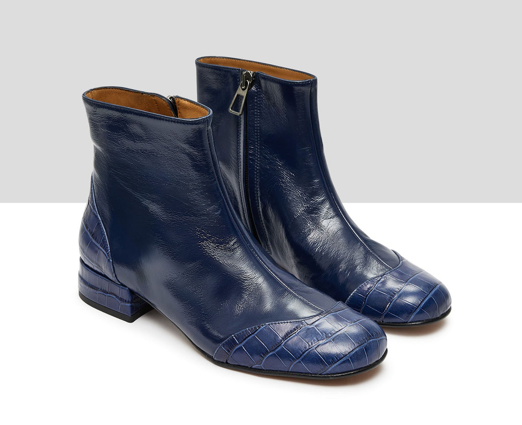 Women's leather ankle boots with a low heel. Kumar