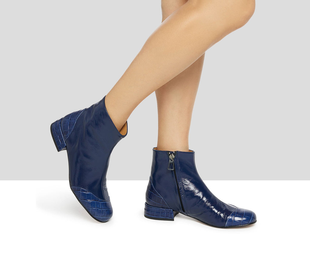 Women's leather ankle boots with a low heel. Kumar