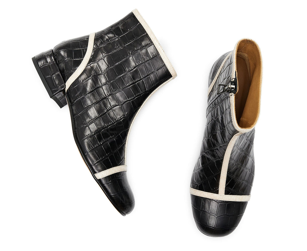 Botín de mujer en piel con tacón bajo. Koko