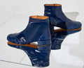 Women's leather ankle boots with a low heel. Kumar