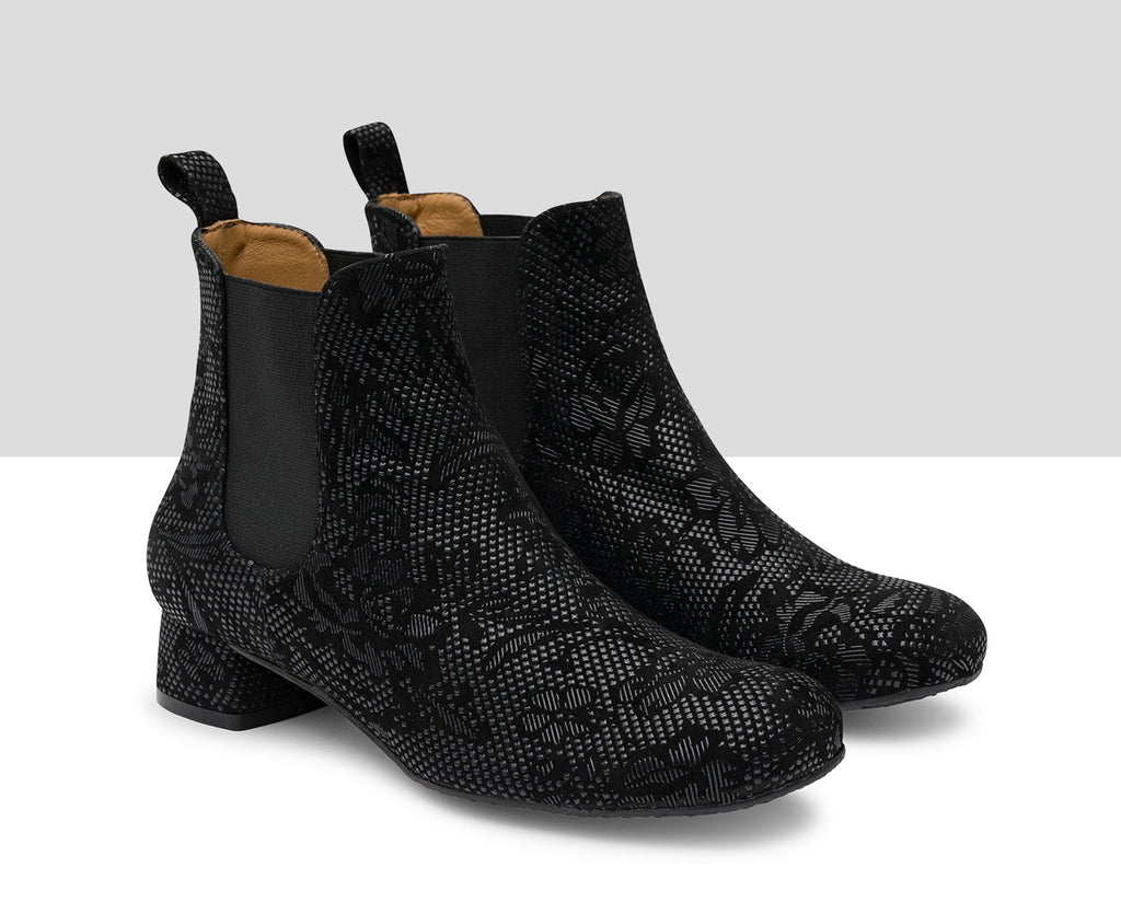 Botín de mujer en piel con tacón bajo. Kishi