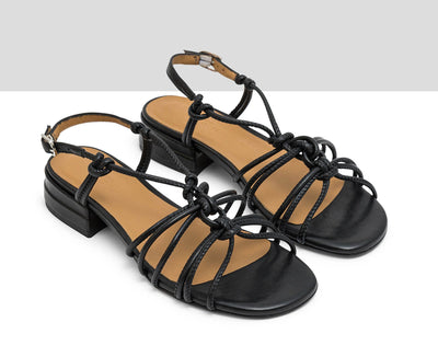 Sandalo da donna in pelle con tacco basso. Jeidy