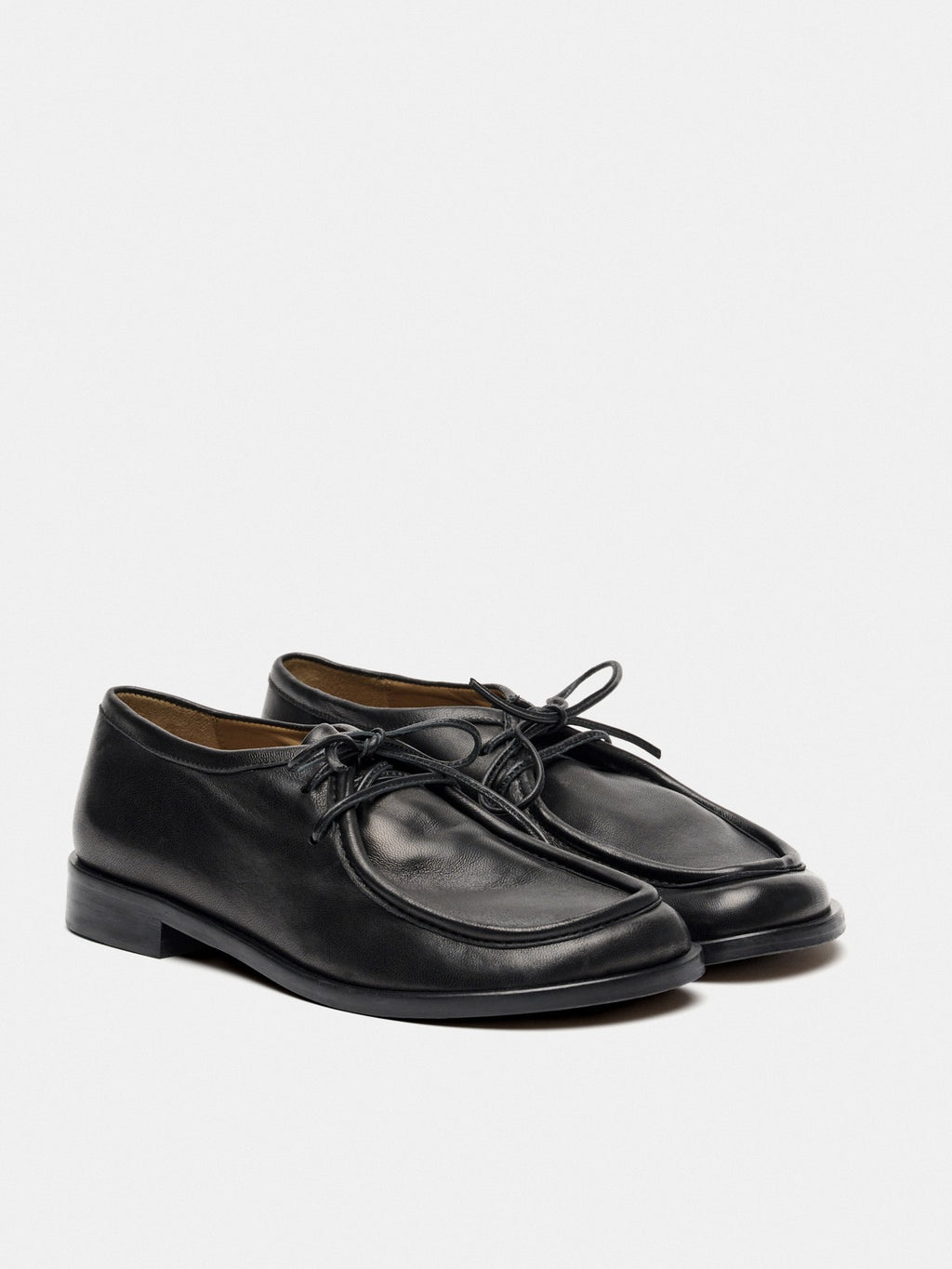 Women's leather shoe with a low heel. Mathis