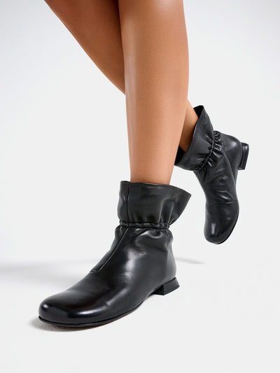 Women's leather ankle boots with a low heel. Maura