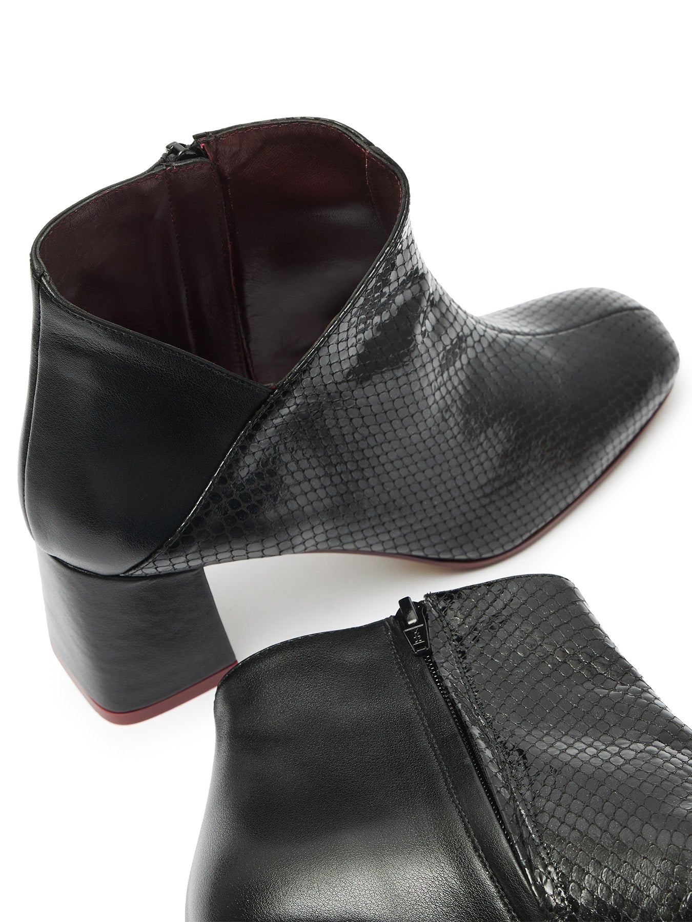 Women's leather ankle boots with a mid-heel. Miho