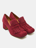 Women's leather shoe with a medium heel. Marga