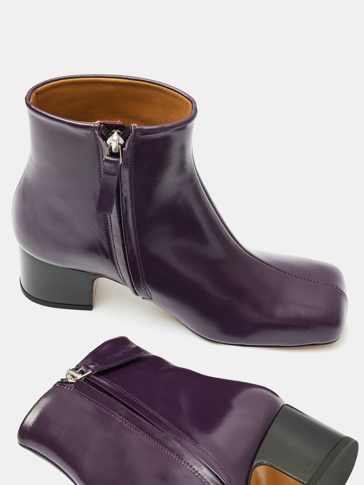 Women's leather ankle boots with a mid-heel. Miho