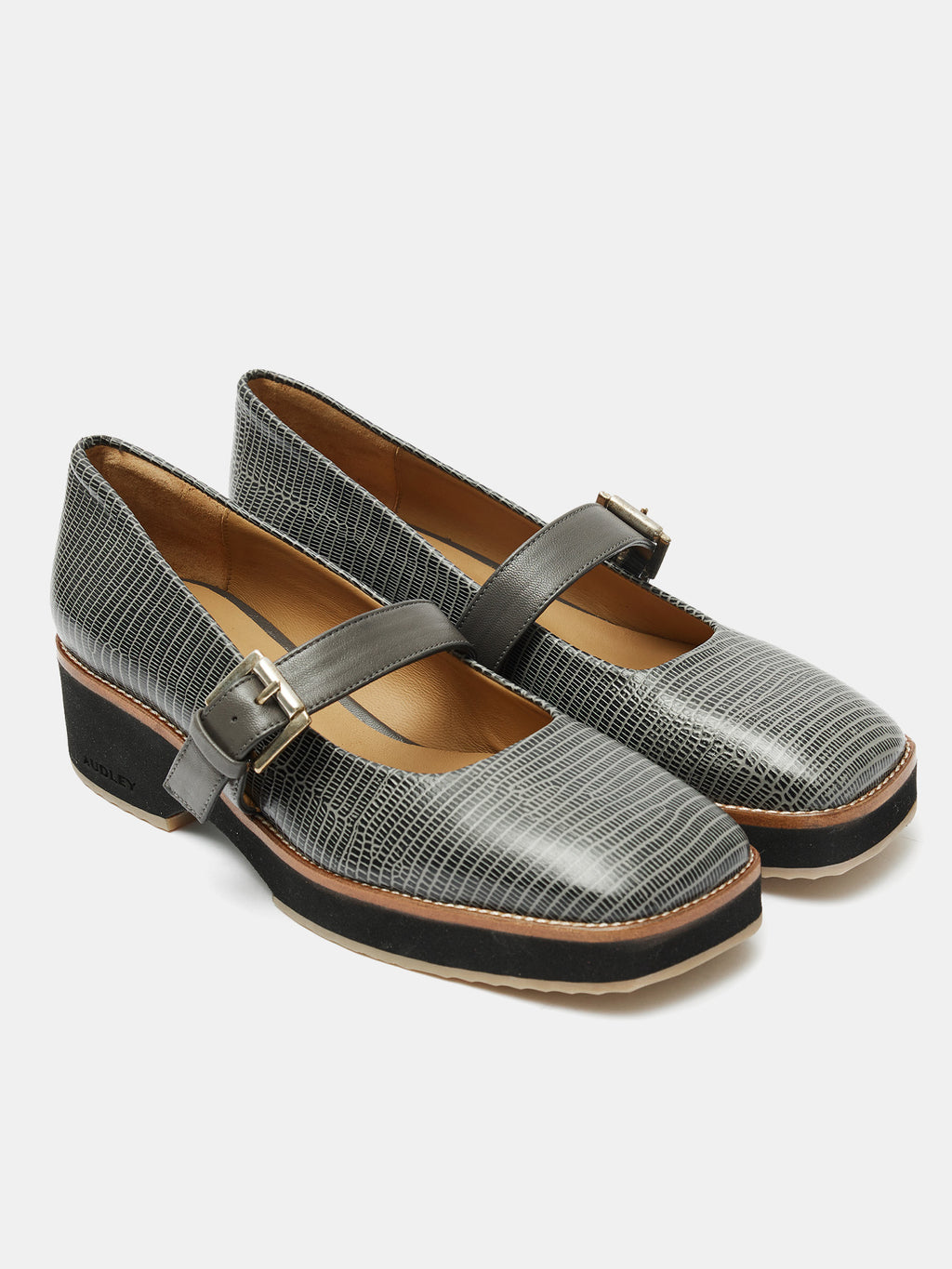 Women's leather shoe with a low heel. Olson