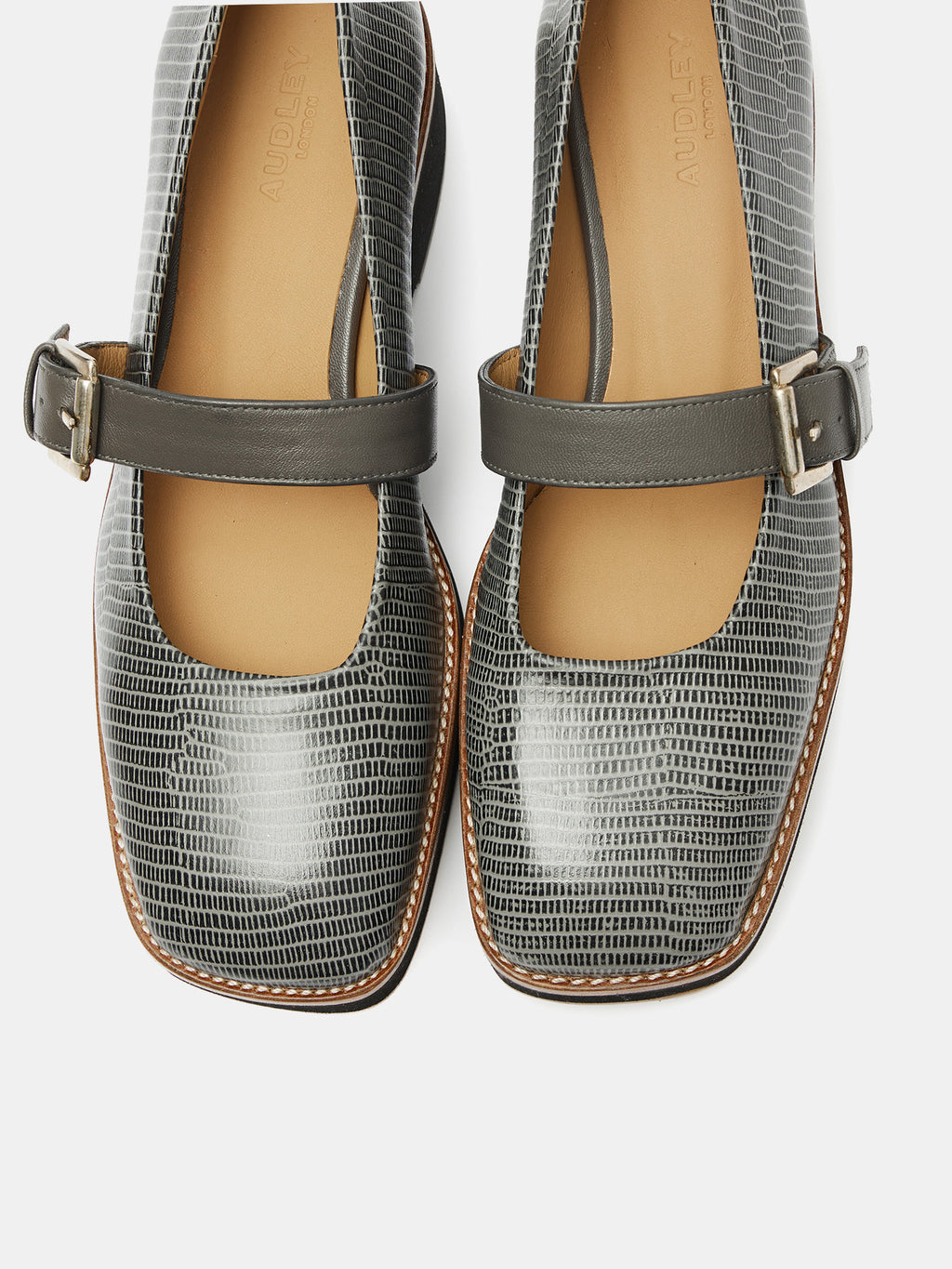 Women's leather shoe with a low heel. Olson