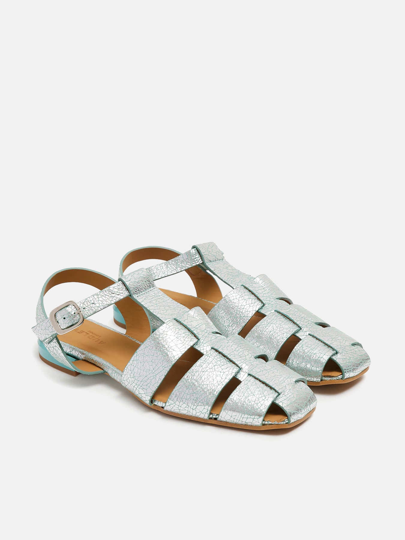 Women's leather sandal with a medium heel. Nyla