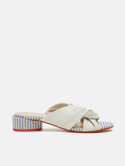 Women's leather sandal with low heel. Cream