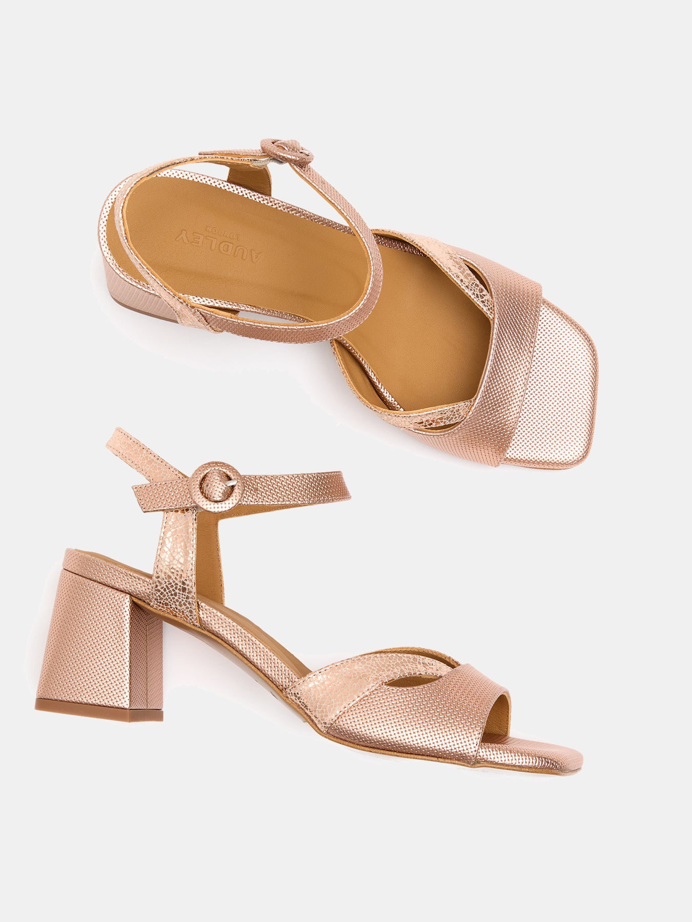 Women's leather sandal with a medium heel. Lenna
