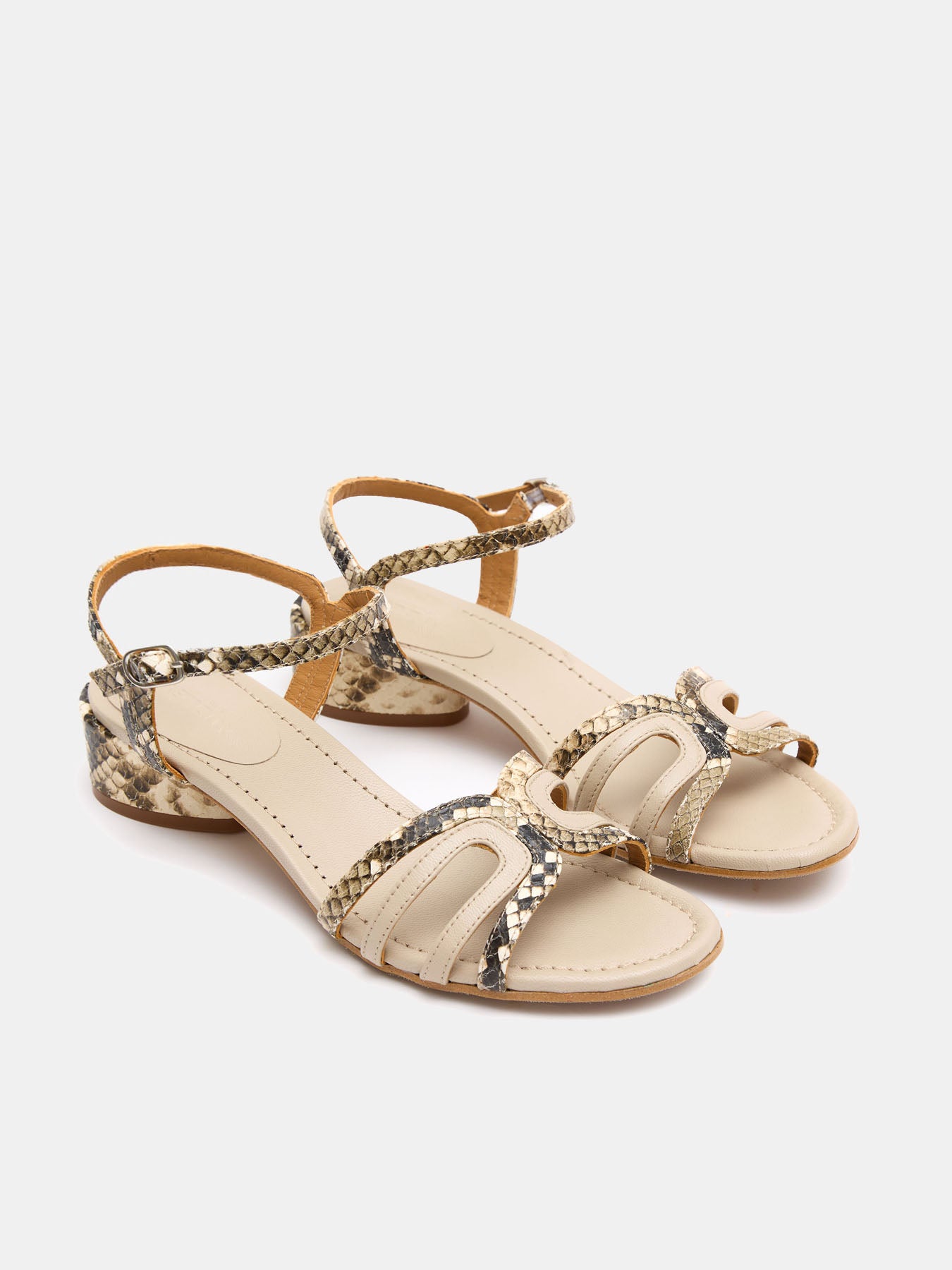 Women's leather sandal with medium heel. Lani