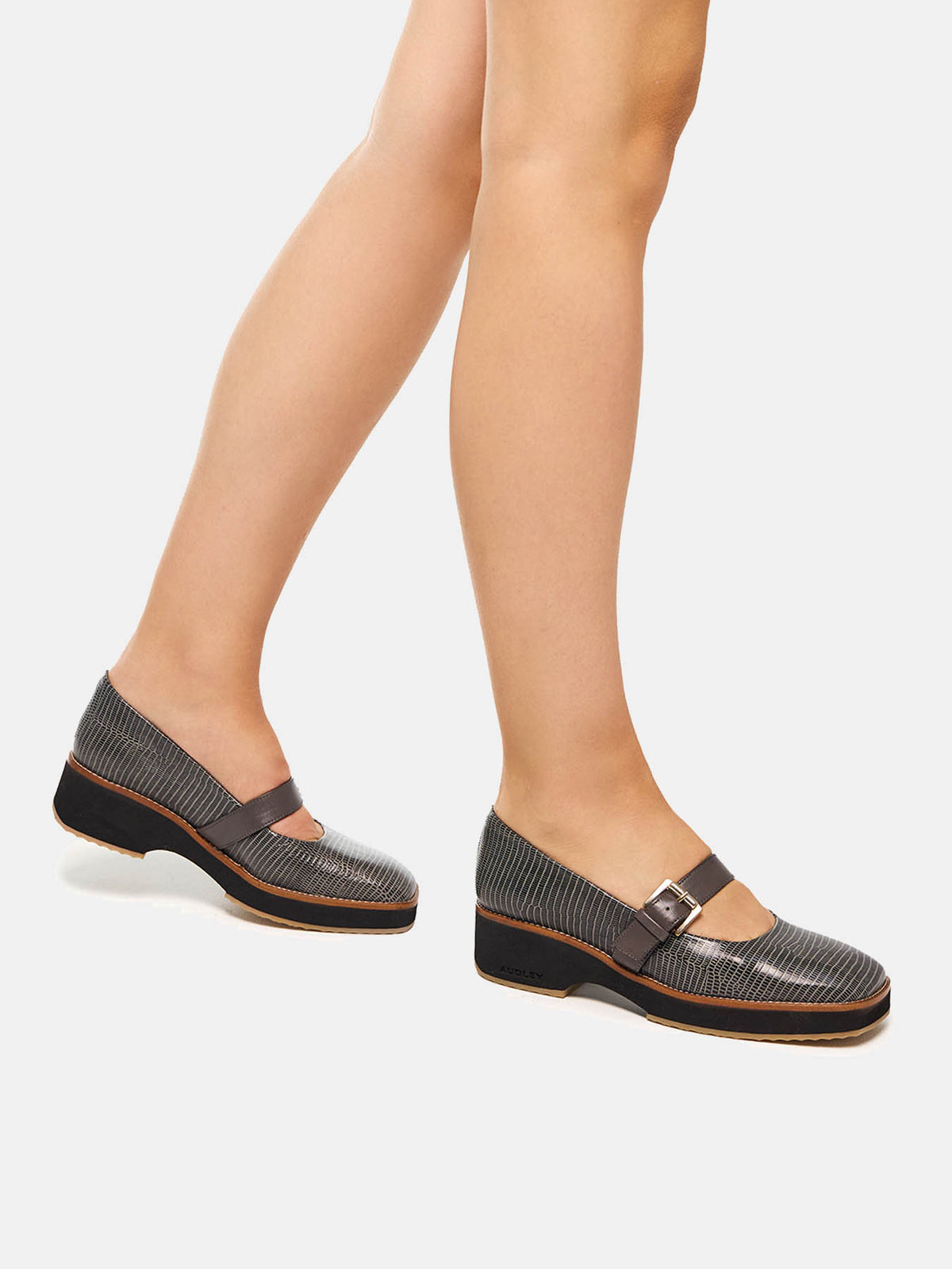 Women's leather shoe with a low heel. Olson