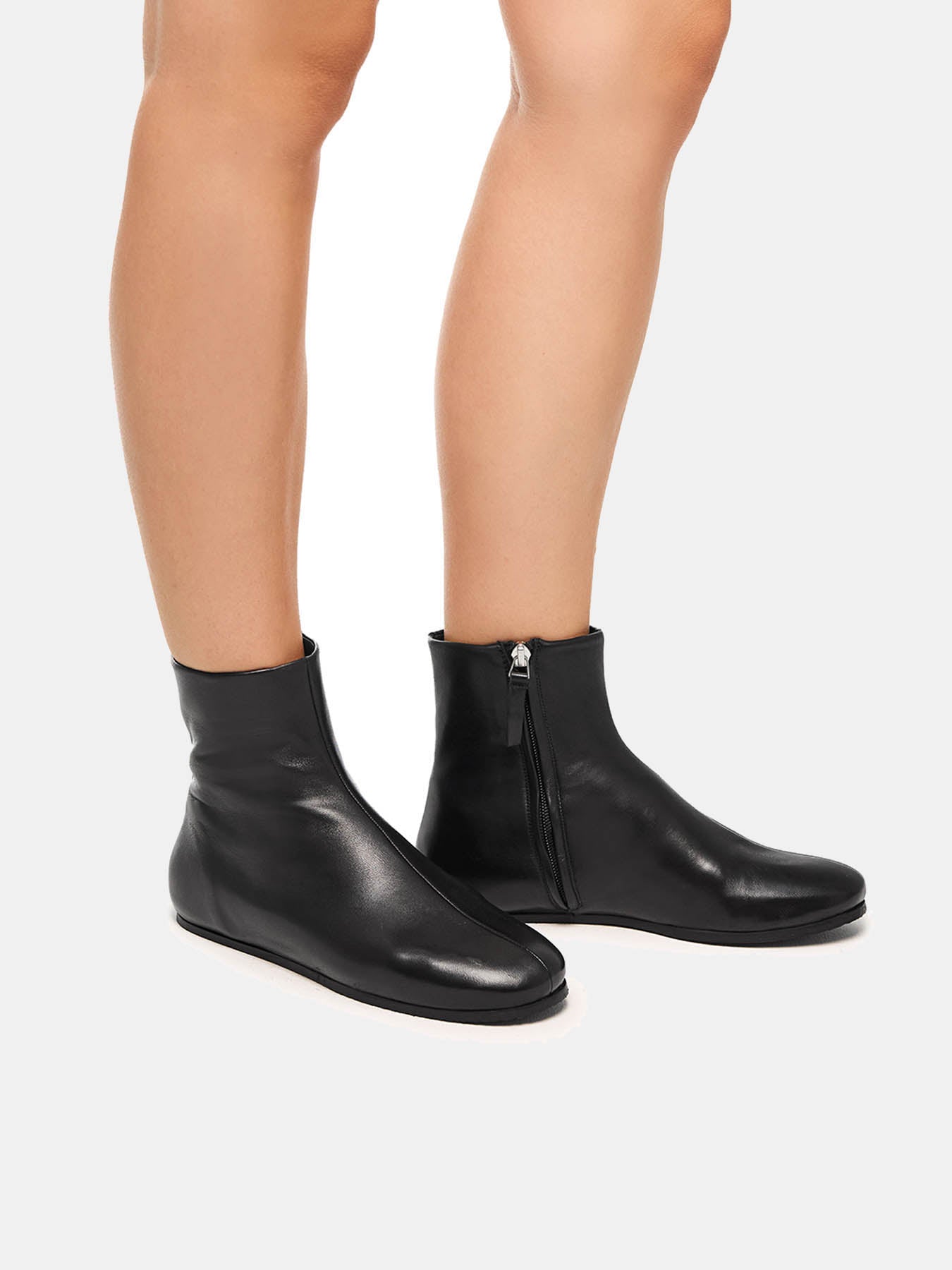 Women's leather ankle boots with a mid-heel. Miho