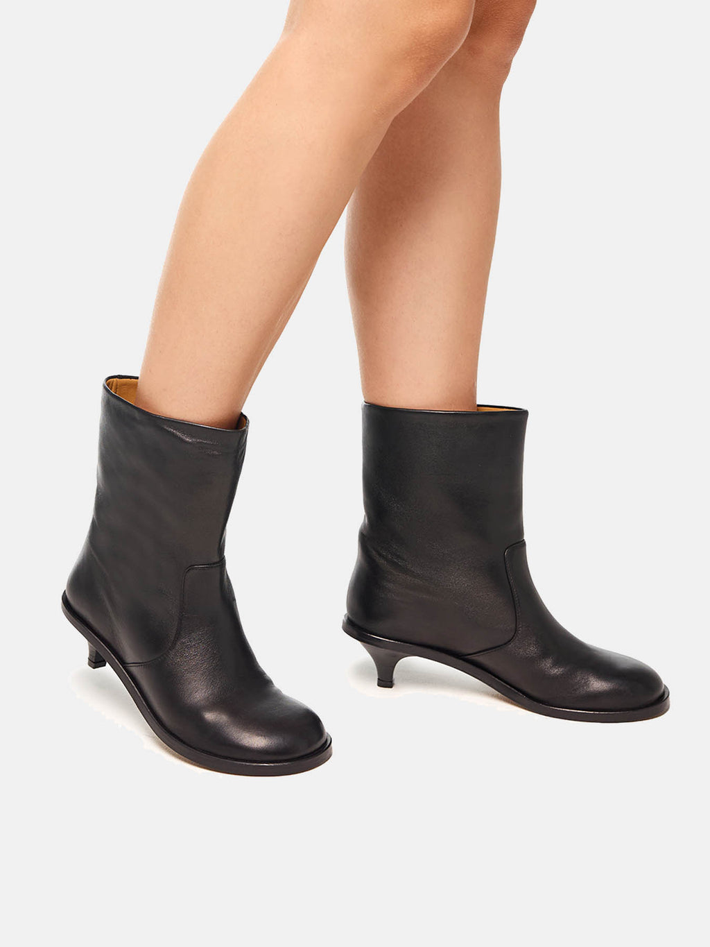 Women's leather ankle boots with a mid-heel. Miho