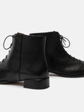 Women's leather ankle boots with a low heel. Mira